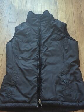 The North Face Women's Black Puffer Vest with High Collar